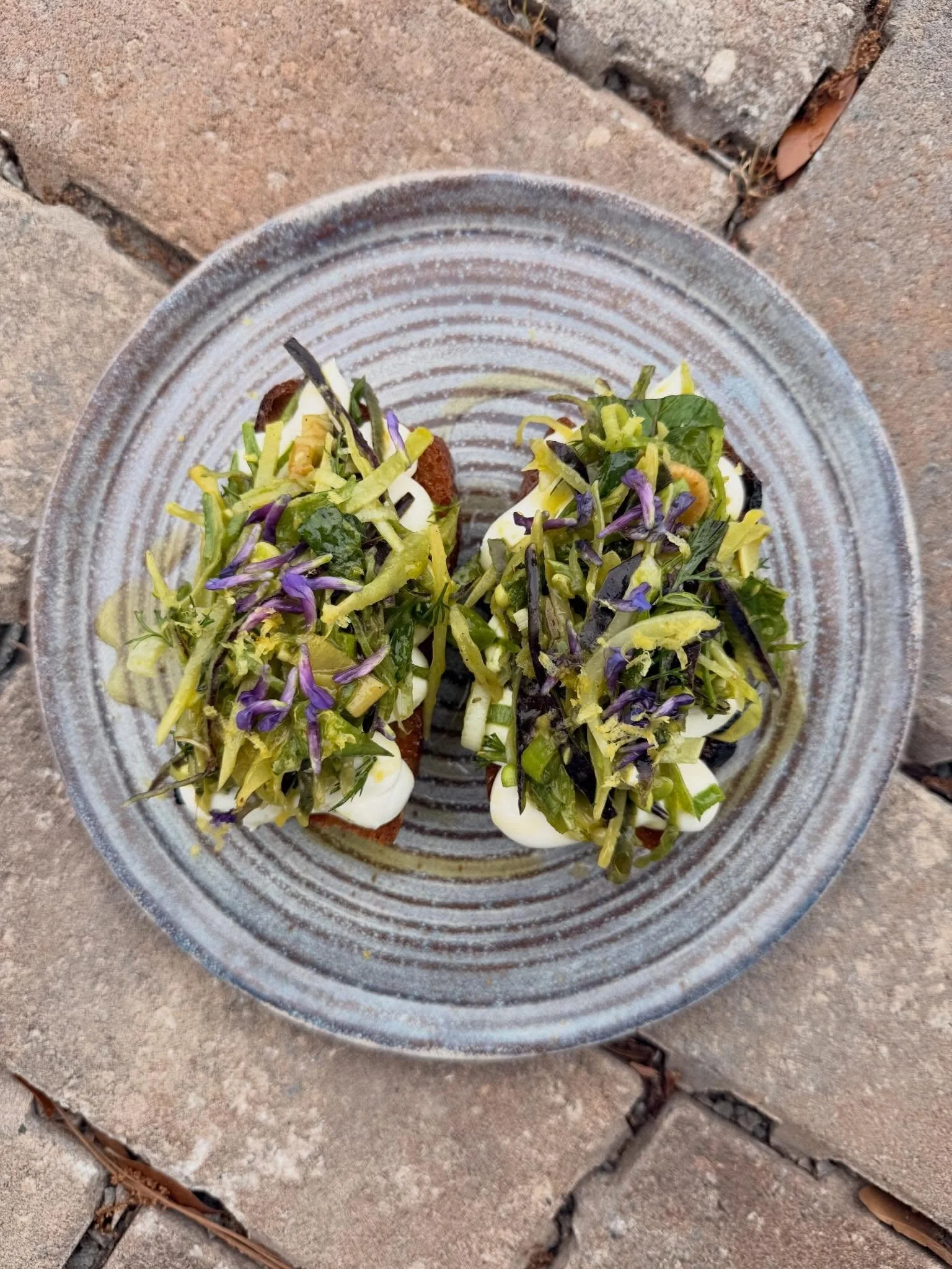 We love a good crostini, Terri has been telling me to put it on the menu forever because they are here favorite.  They are also a great way to showcase some of the breads we made here in the shop.  So, we have two, One seasonal that will change with 