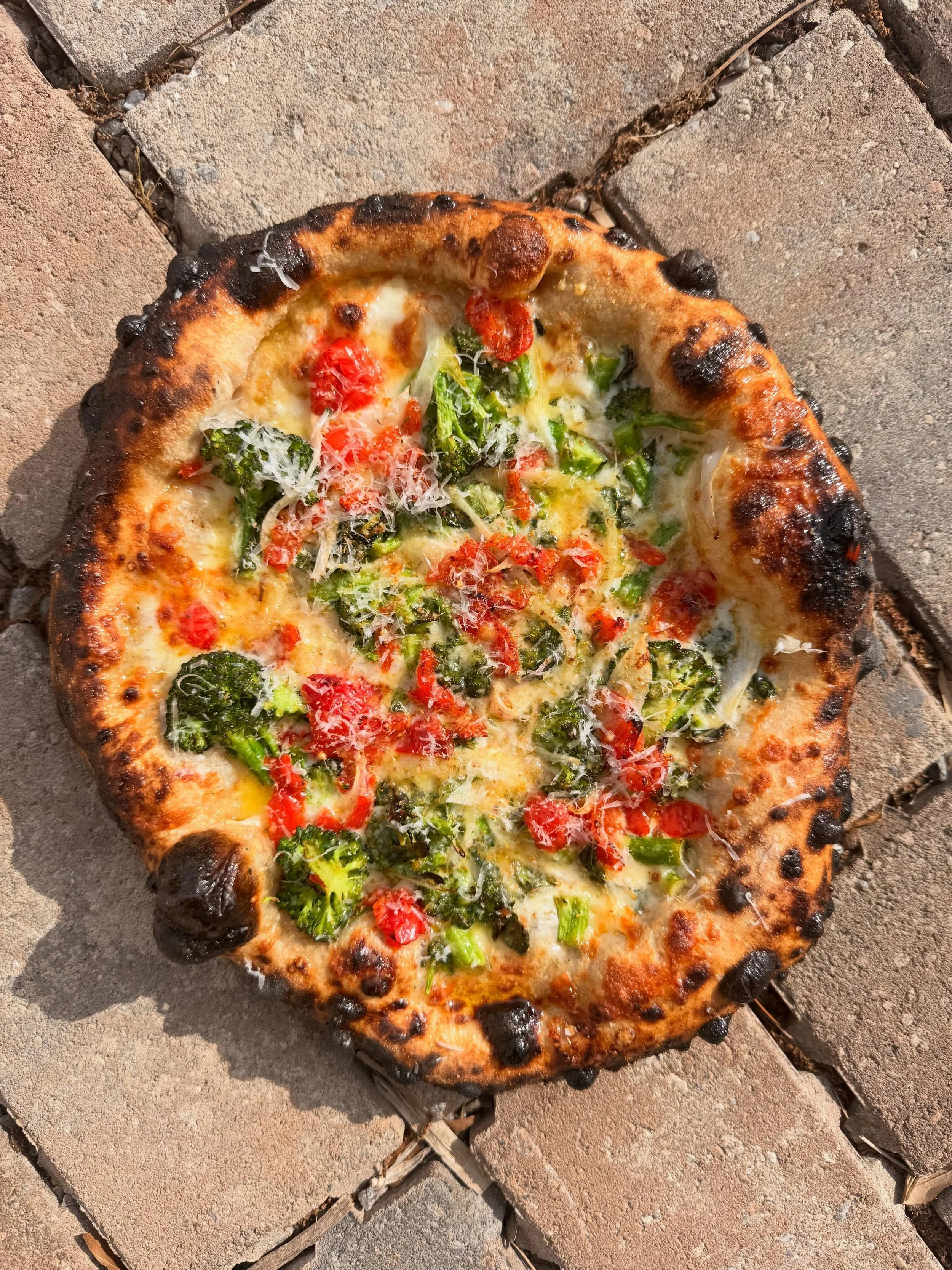 Busy week, but we still got some new ones for you this week.  Come check it out for yourself, before the weather gets damp.

Broccoli Rabe - garlic cream, smoked provolone, tropea onion, peppedews, agrumato