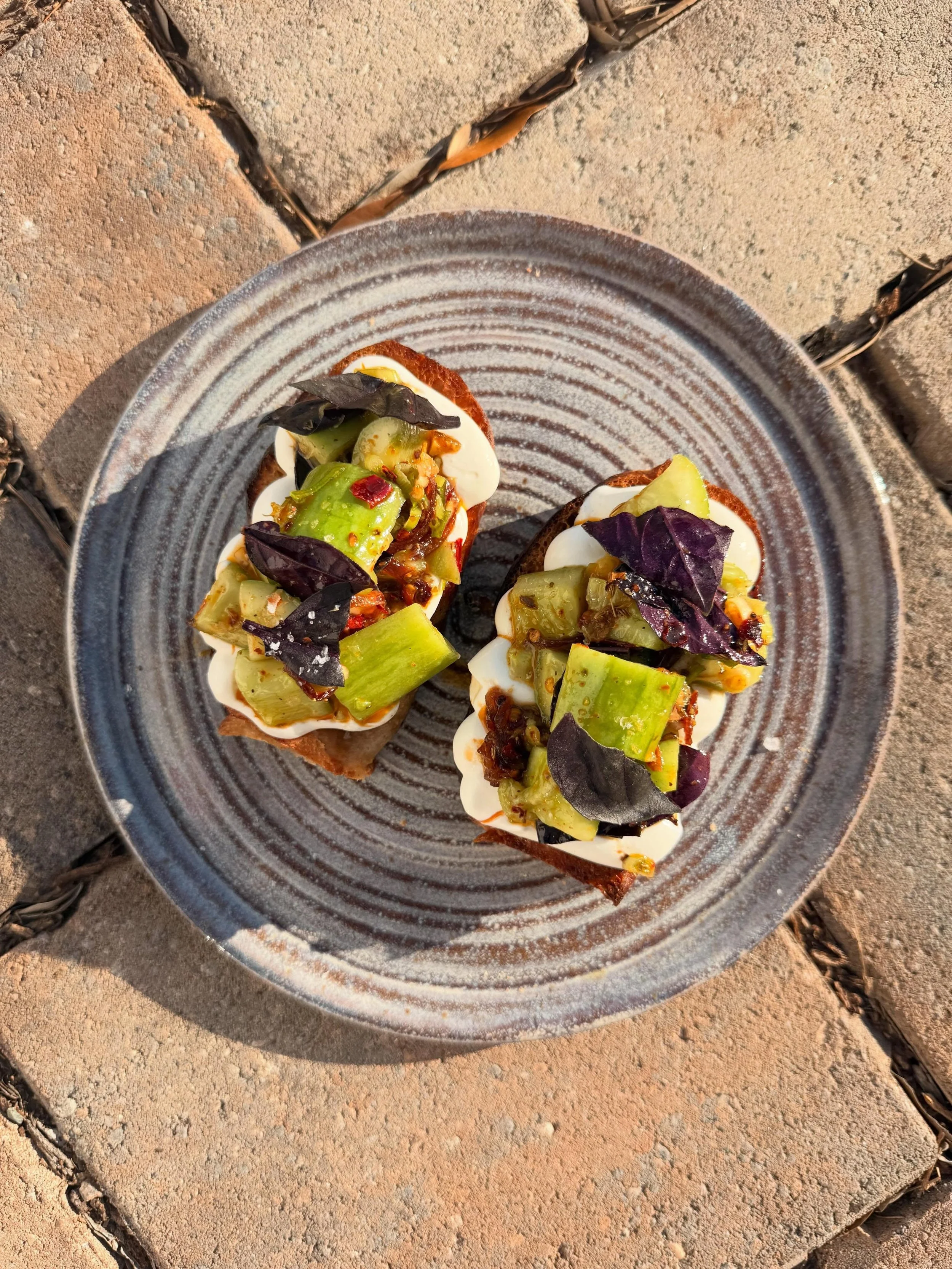 New seasonal crostini on this weekend.  First of the year cucumbers tossed in our Italian chili crunch(caper, anchovy, oregano, fennel seed, pistachio, Calabrian chili flakes), all on our sourdough focaccia.  Pair this one with a bottle of crisp, ref