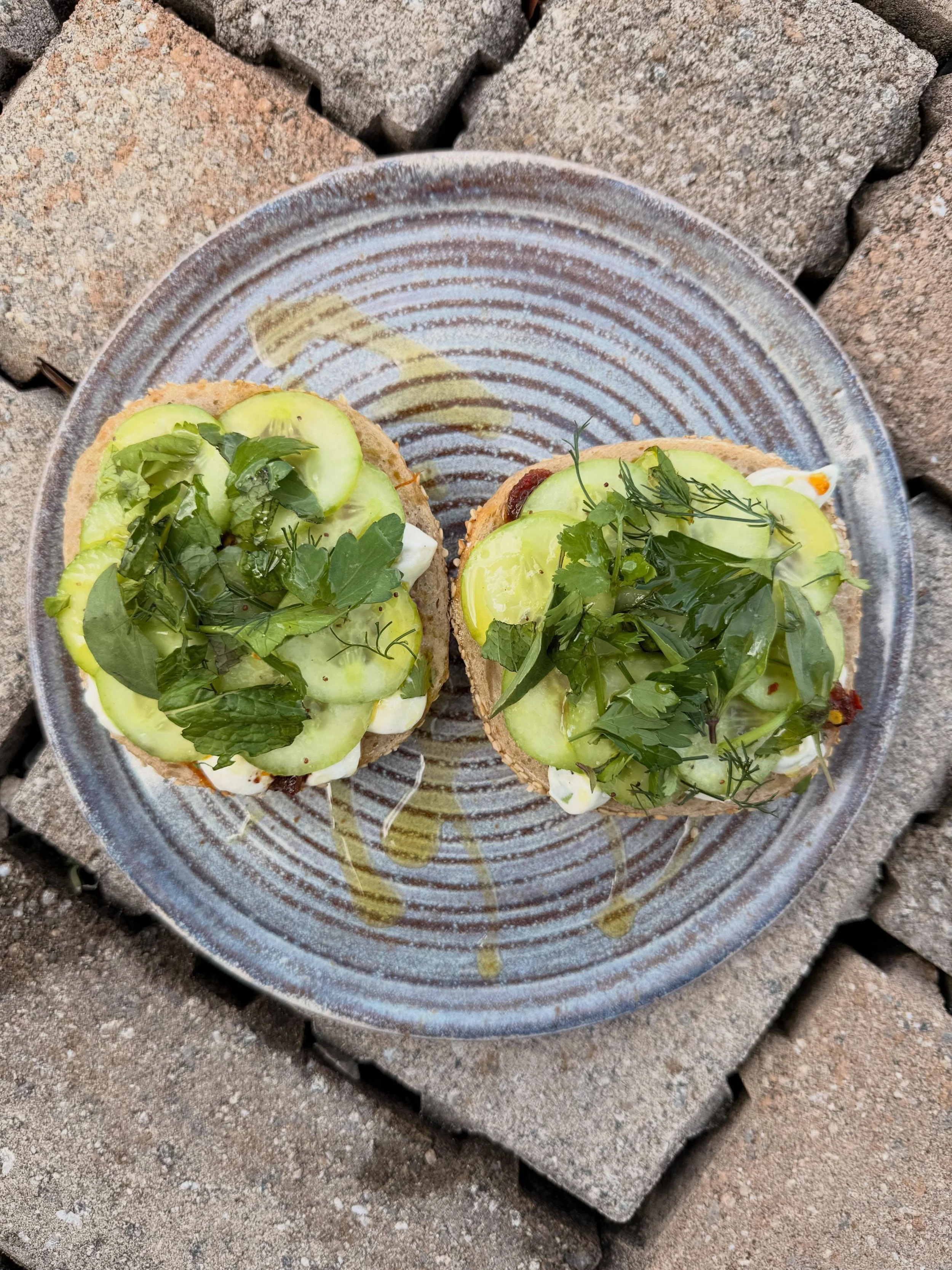 New seasonal bagel on this weekend.  This is my new go to combo, I have been eating it all week and you should too.  Lots of bagels and goodies this weekend, so swing on by. 

Cucumber - scallion smear, Italian chili crisp, marinated cucumbers, lots 