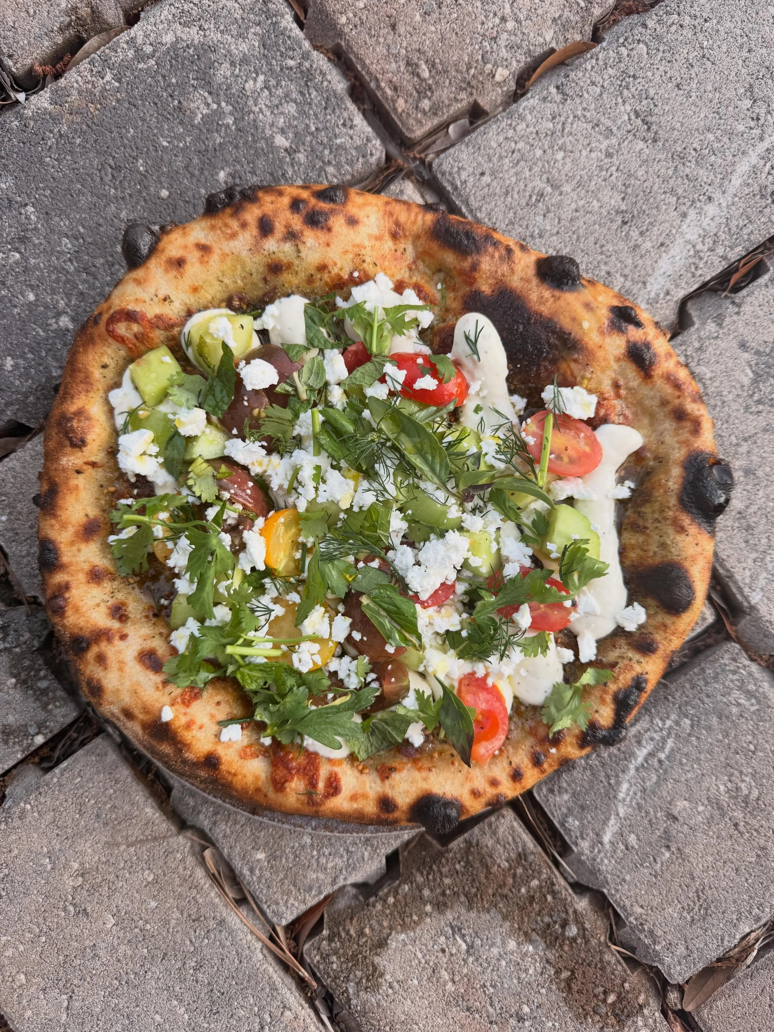 Another new one on and this one might stick around for awhile.  It might be the perfect summer pizza, that&rsquo;s not a pizza at all.  A nod to our favorites @zandzdc .  So maybe it&rsquo;s time to try something new.

Manoushe - garlic oil, Z&amp;Z 