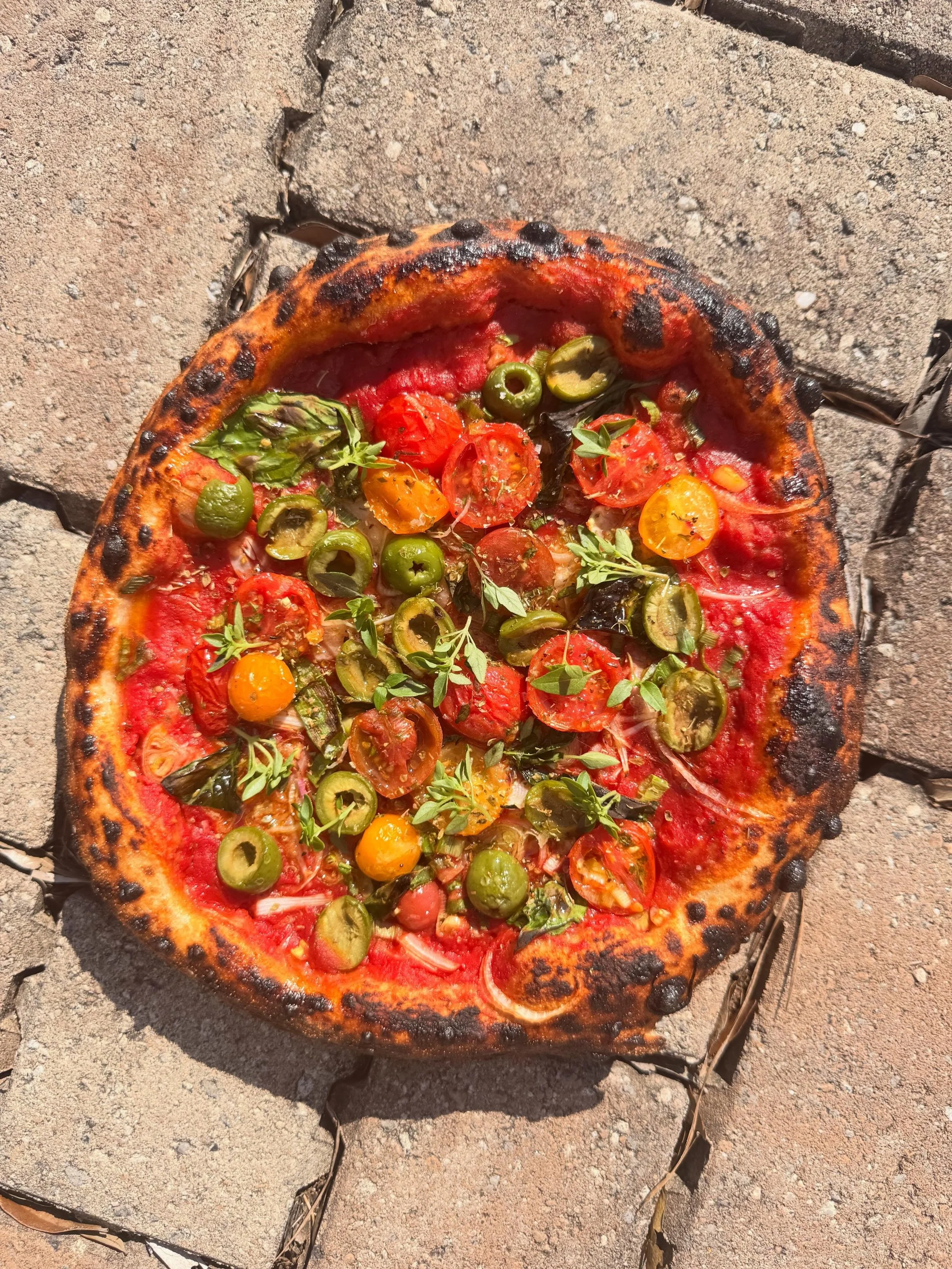 More tomatoes, more new pies, new vegan pie.  Add burrata and a high five if you wish.  See you around.

Pomodoro - red sauce, garlic, basil, tropea onion, olive, marinated cherry tomato
