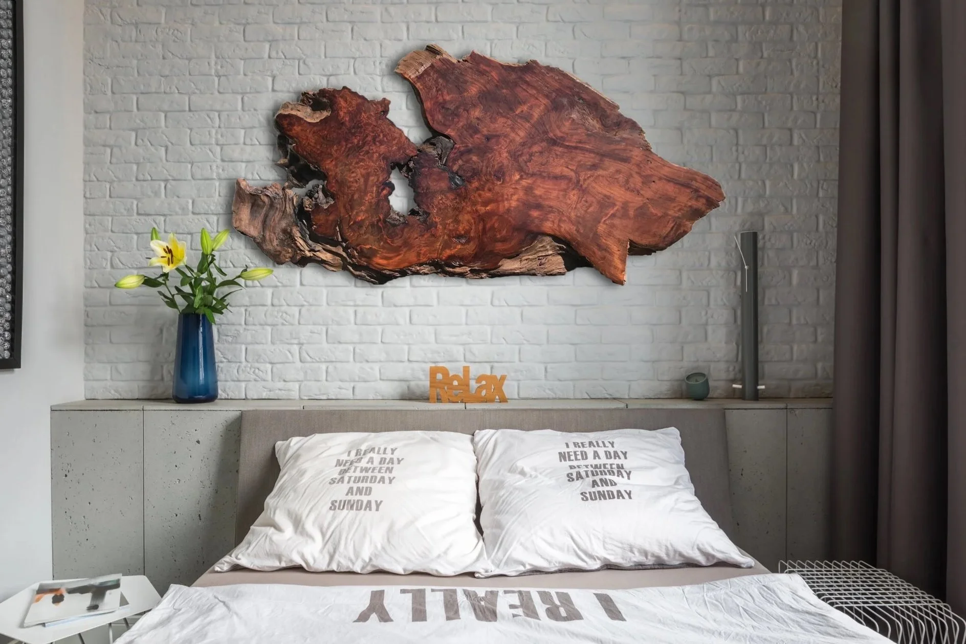 Live Edge Redwood Headboard on a Brick Wall Bedroom