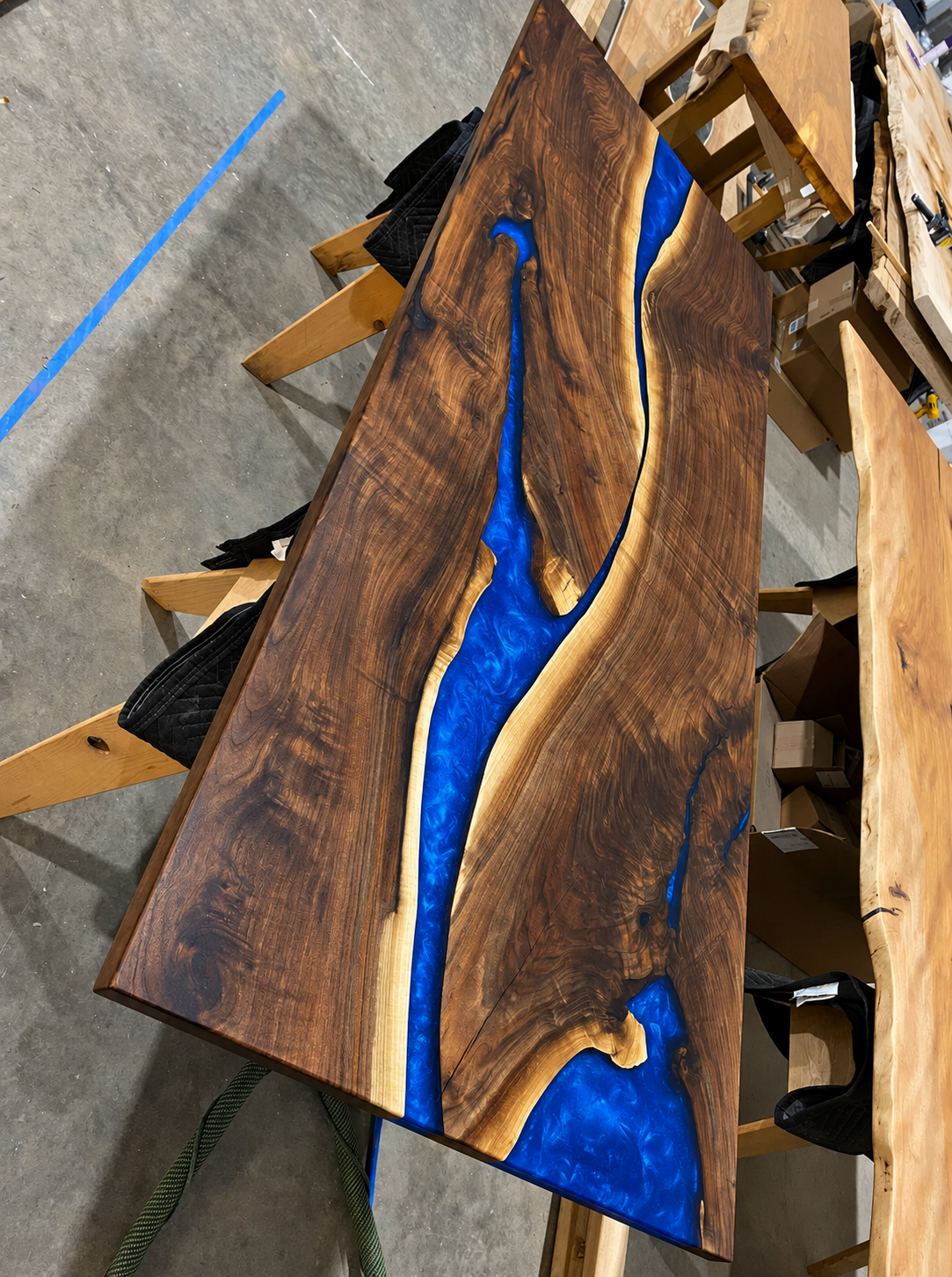 Wild Shaped Black Walnut Sliding Door with Swirly Metallic Ocean Blue Resin