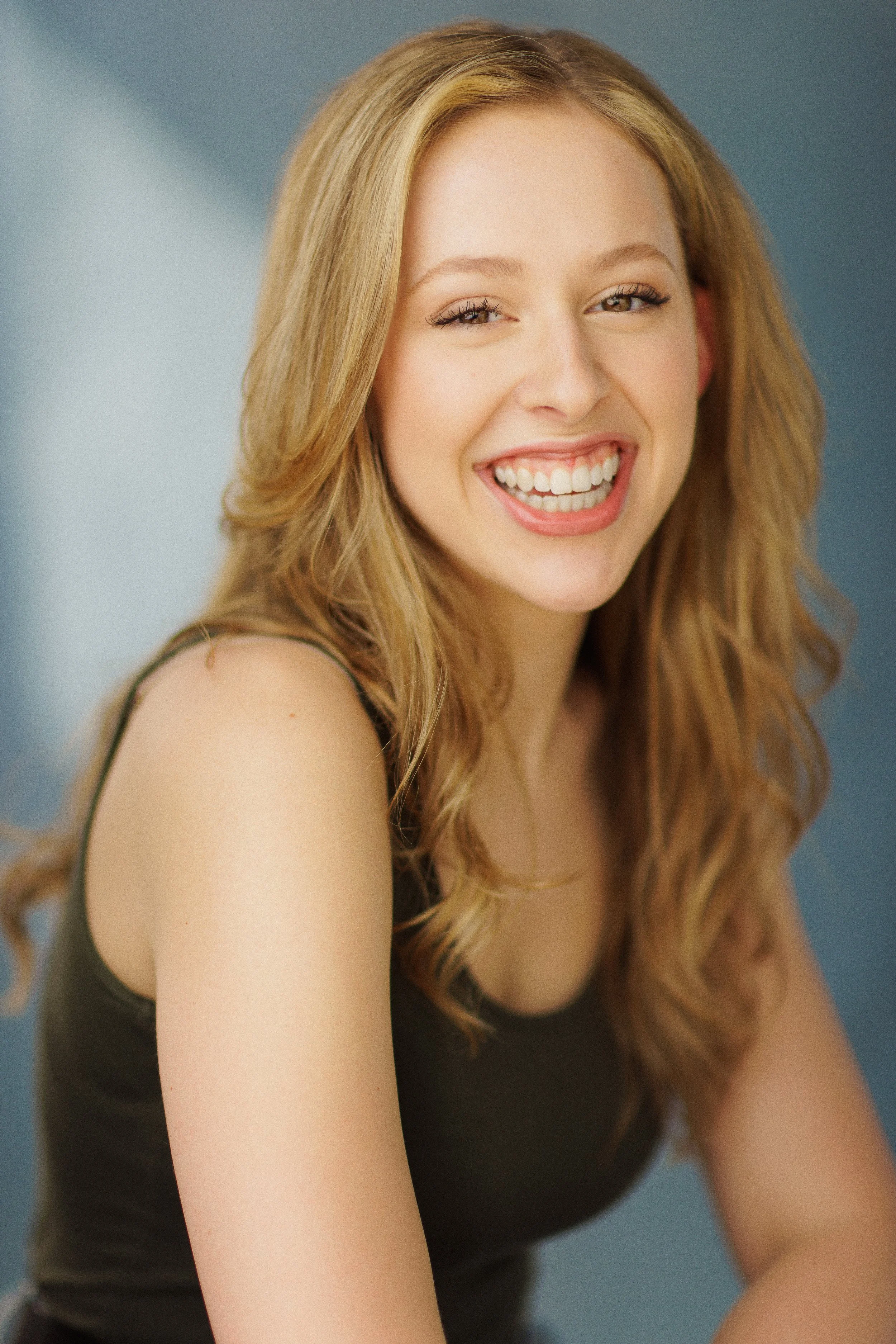 Headshot by Adam Hills