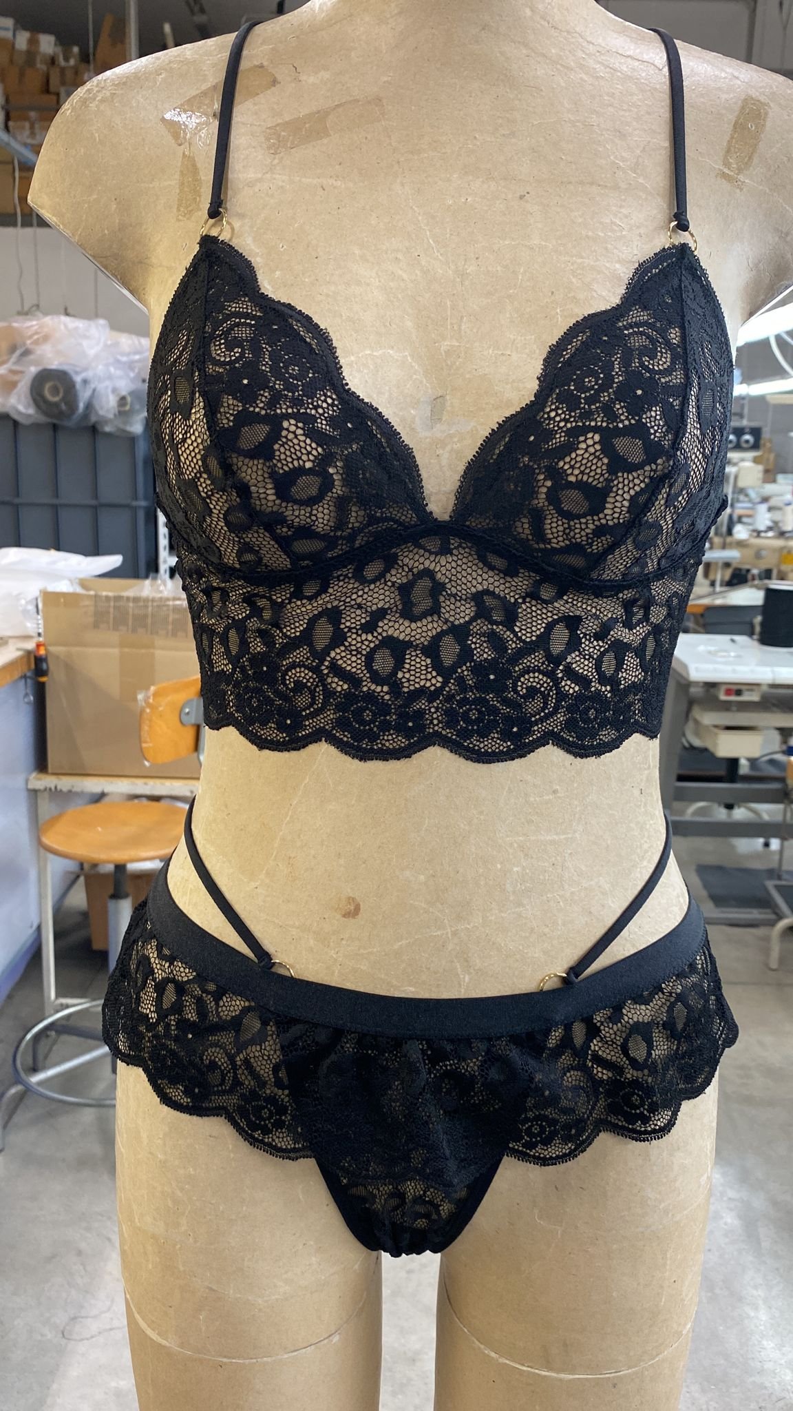 Italian Alta Moda patternmaker drafting a bespoke pattern using the draping method in the Rome Atelier.