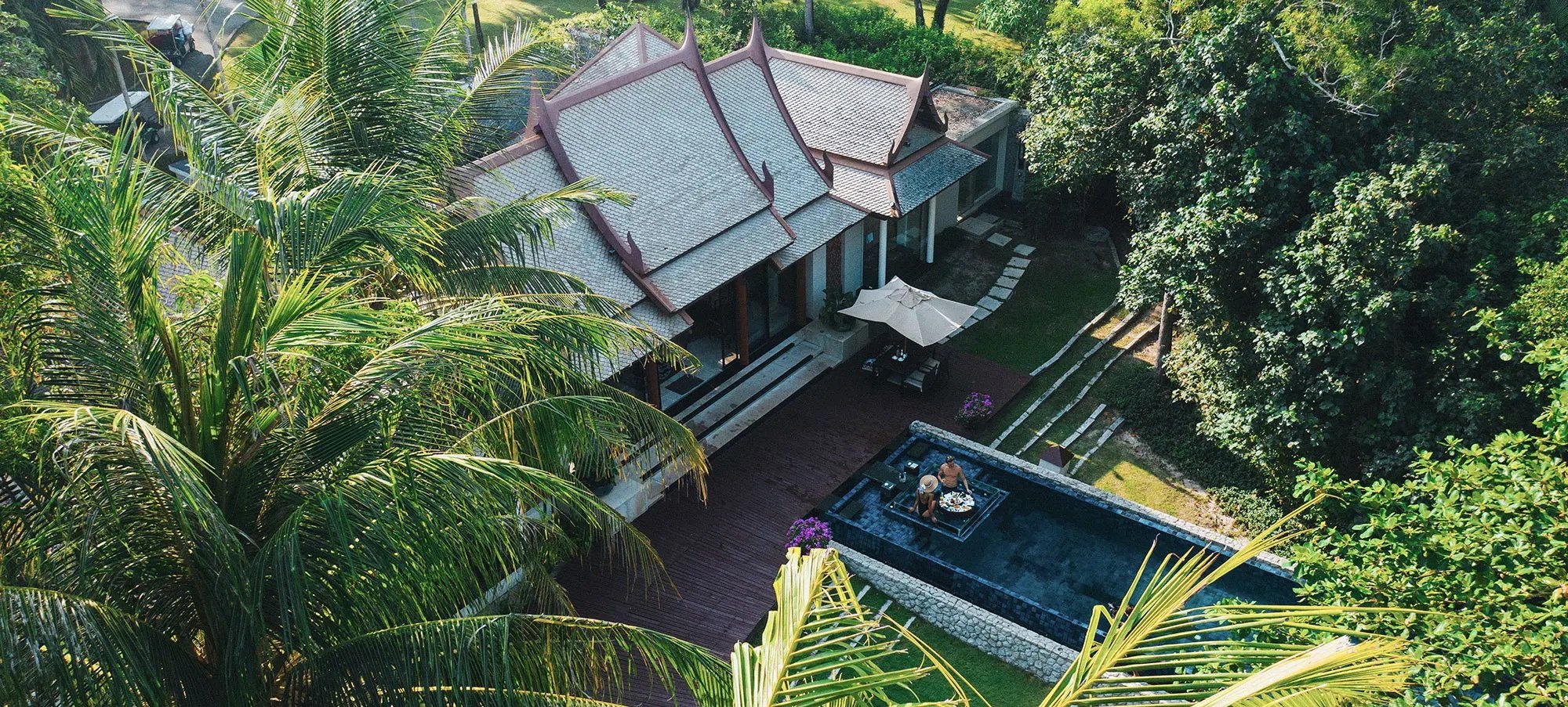 double-pool-villa-floating-breakfast-couple-aerial.jpeg