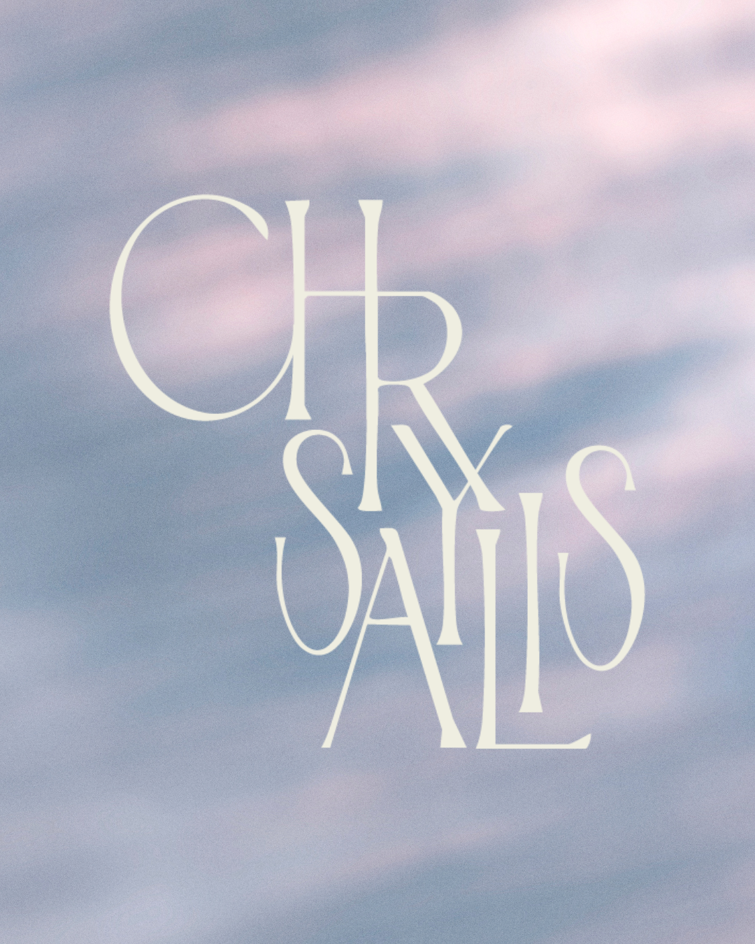 Text saying 'Chrysalis' against a background of sky with soft clouds.