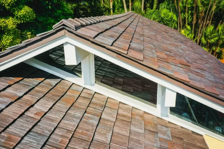 Expert roof maintenance for a Los Olivos estate, featuring a detailed inspection and cleaning of high-end shake tiles.