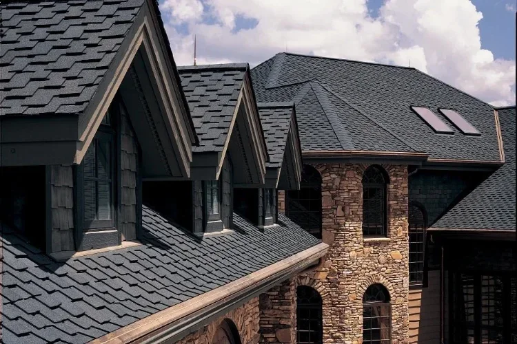 Professional roof maintenance for a Santa Ynez estate, featuring complex shingle inspection and oak canopy debris removal.