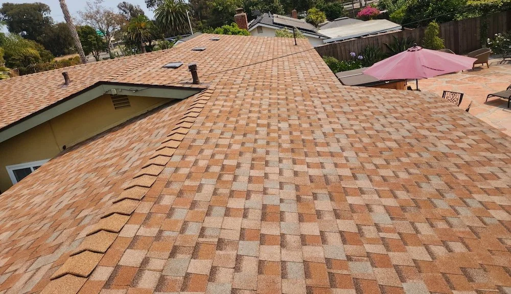 Finished Landmark Home Edition asphalt shingle roof with uniform new shingles on a Santa Barbara home after replacement