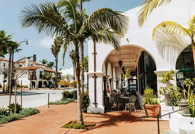 Traditional Santa Barbara architecture featuring red clay tile roofing, serviced by local roofers.