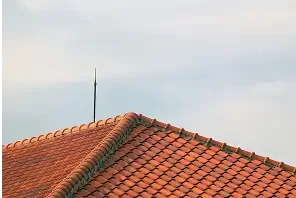 Professional clay tile roofing installation on a Mediterranean-style home by Santa Barbara roofing contractors.
