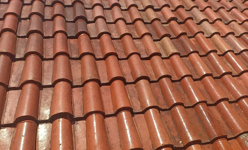 Clay tile roof replacement in Solvang, CA, ideal for Mediterranean-style homes and historic restoration.