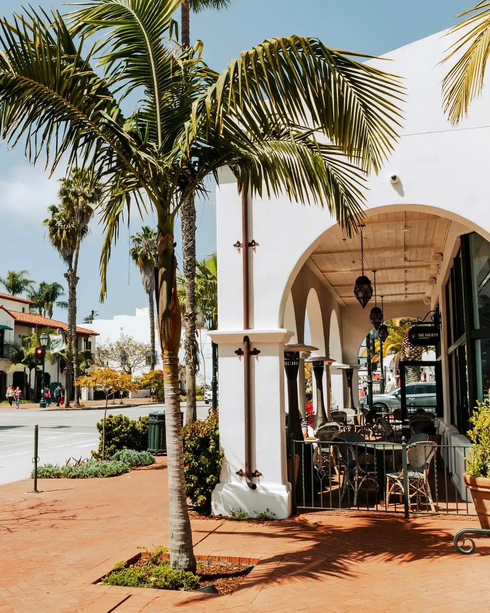 Traditional Santa Barbara architecture featuring red clay tile roofing, serviced by local roofers.