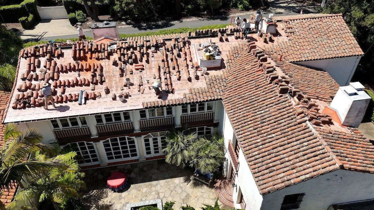 The Quality Roofing team at work on a residential tile roof, serving the Santa Barbara community we support.
