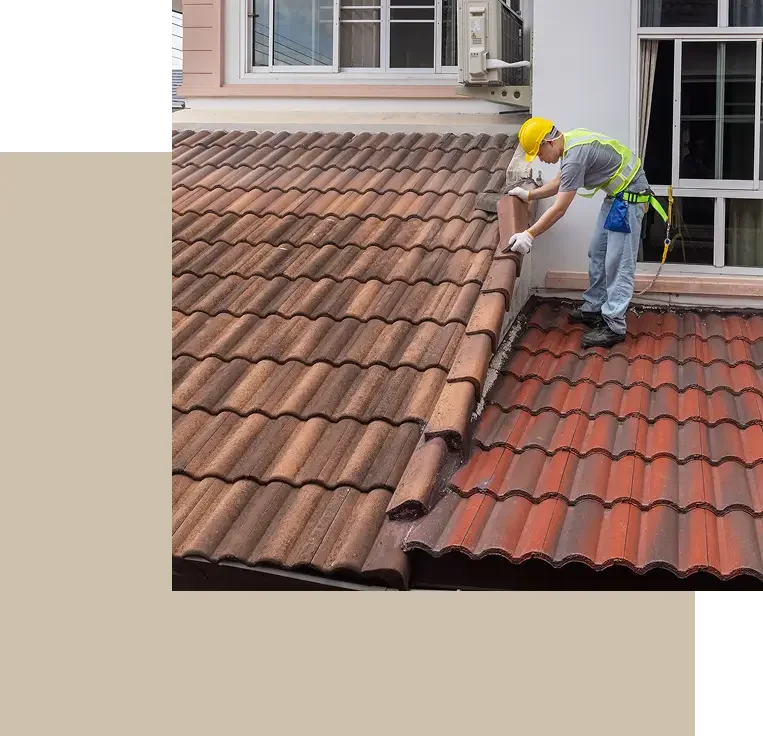 Roofer installing tile during a residential roof replacement in Santa Barbara.