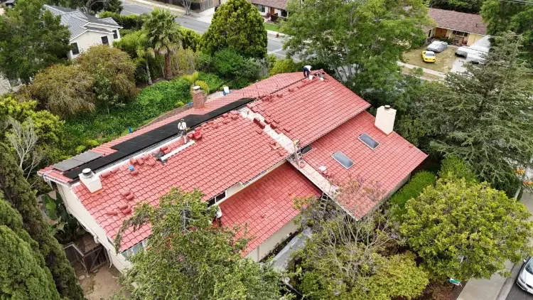 Expert roof maintenance in Summerland, CA, featuring a complete tile roof inspection, debris removal, and ongoing care.