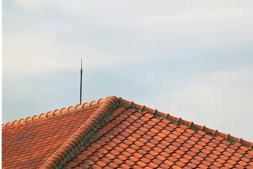 Traditional S-profile red clay tile roofing, a signature Santa Barbara Spanish Colonial aesthetic.