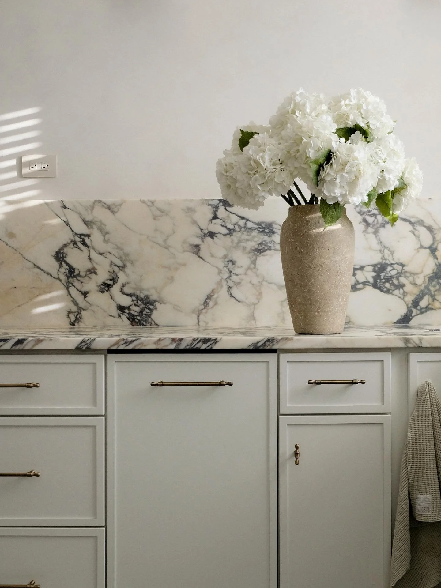 A glimpse into the kitchen, mid-transformation. Some materials don’t just elevate a space, they define it.