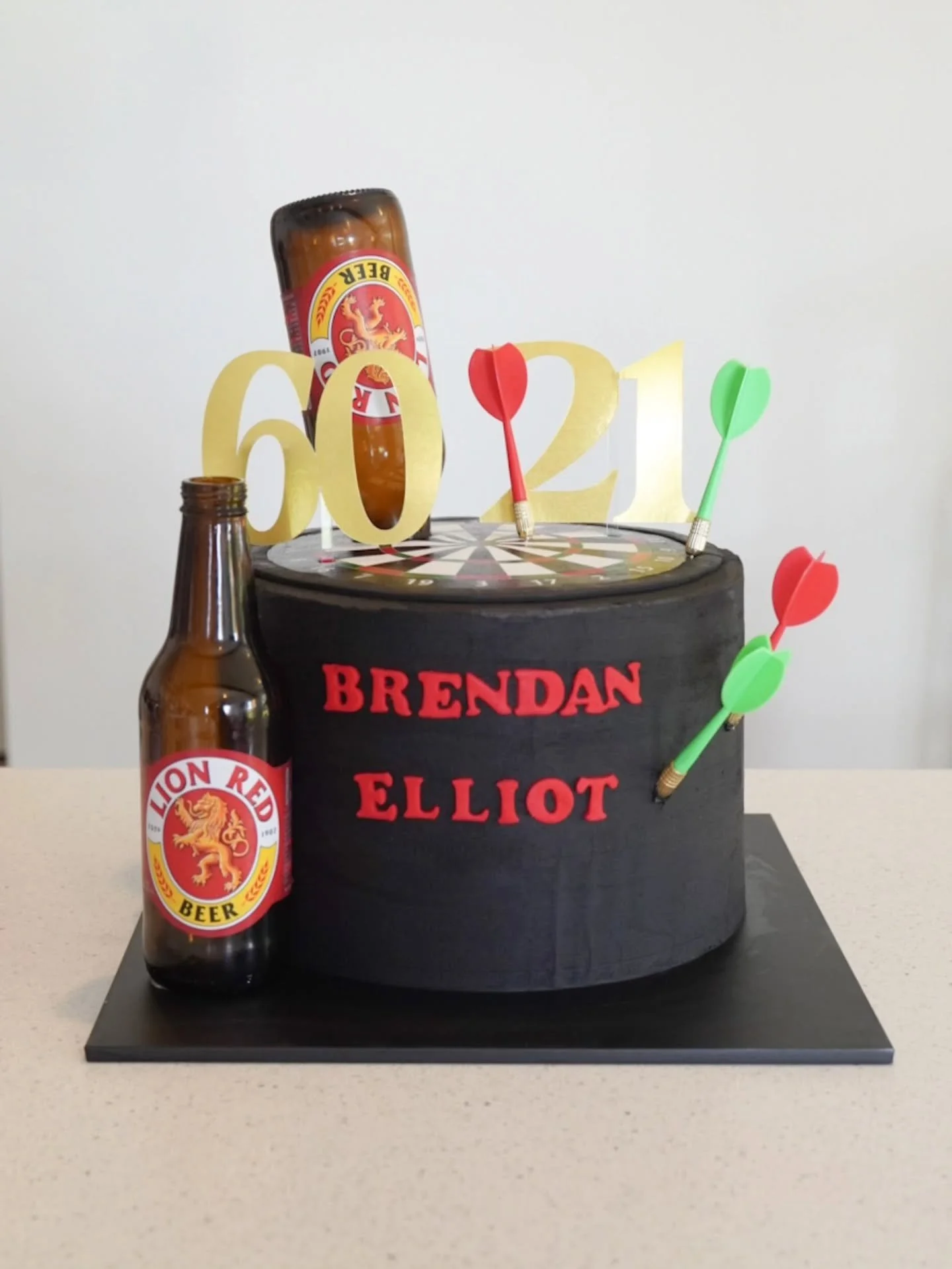 Combining @lionrednz and darts for a fun 60th and 21st! 

Toppers by @toppersand_tags 
Edible print by me 💜

#nzcake #celebrationcake #aucklandcake #torbaycake