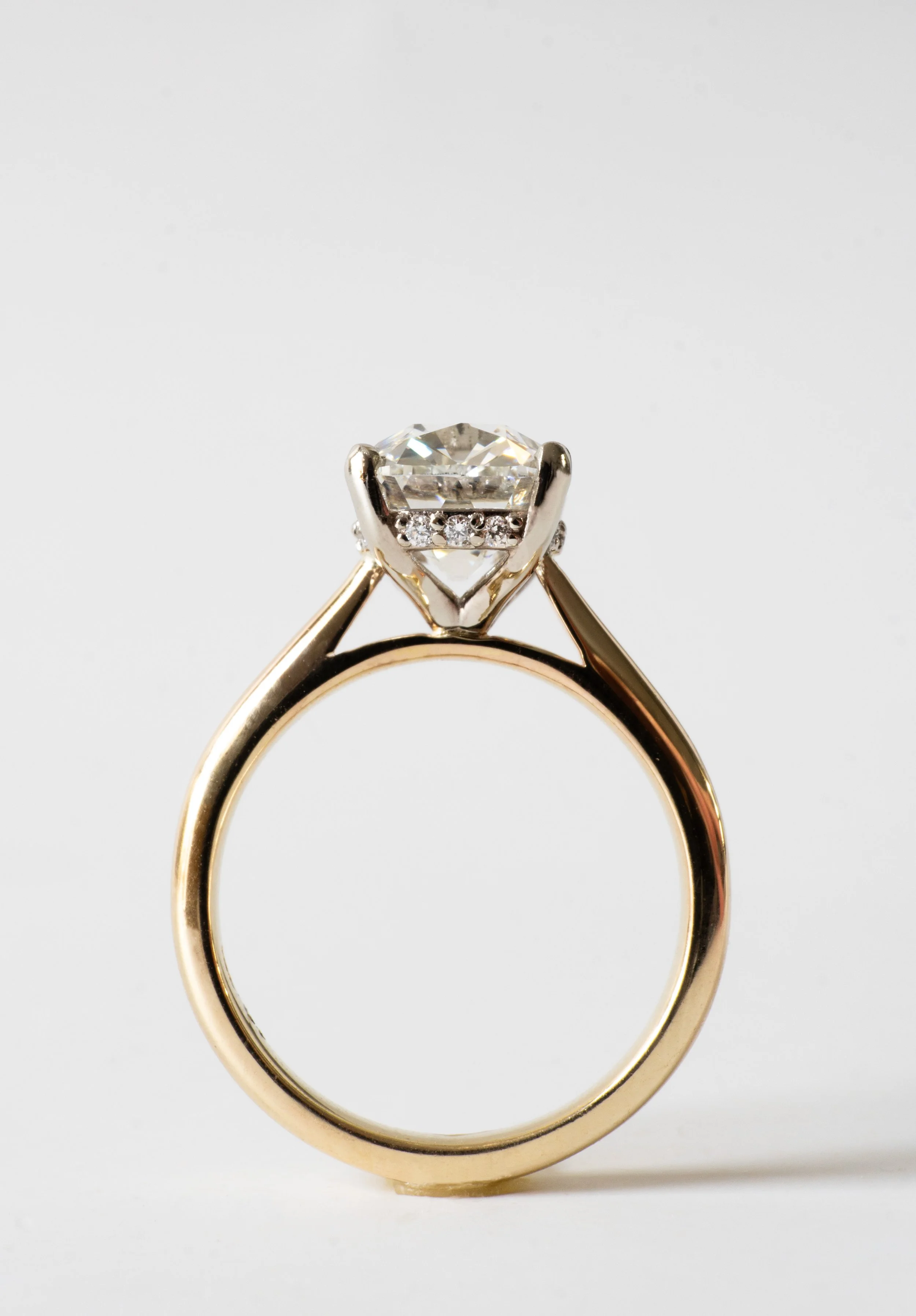 johns engagement ring standing.jpg