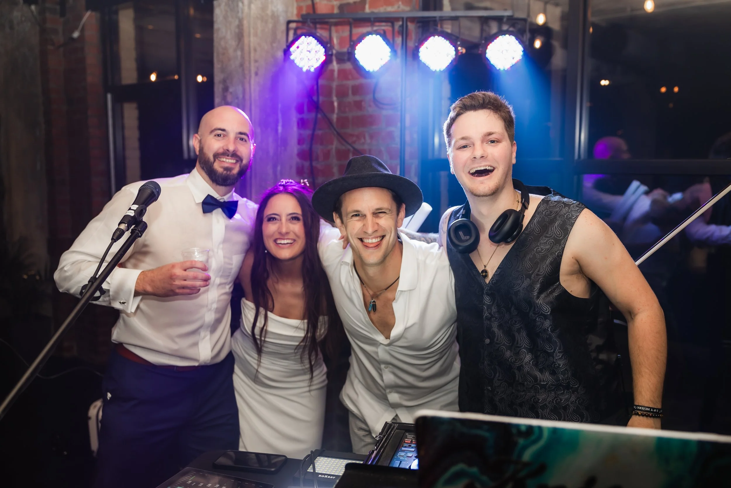 A happy couple with Krispee Biscuits at their wedding. Special event. live music. fun. party. afterparty. cocktail hour. post wedding. dj. violin. marriage. married. support. love. 