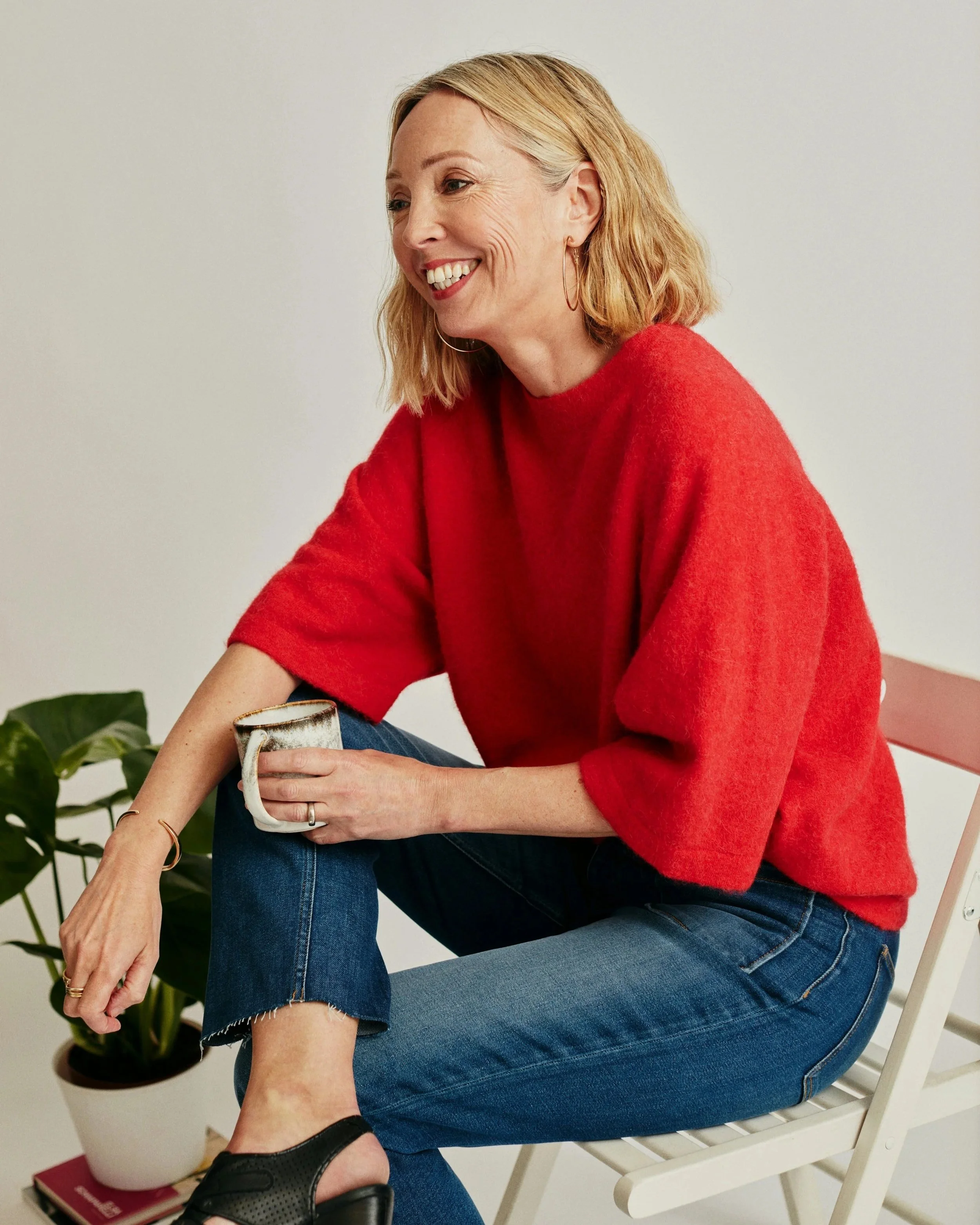 Middle Class woman in red shirt who looks "fine."