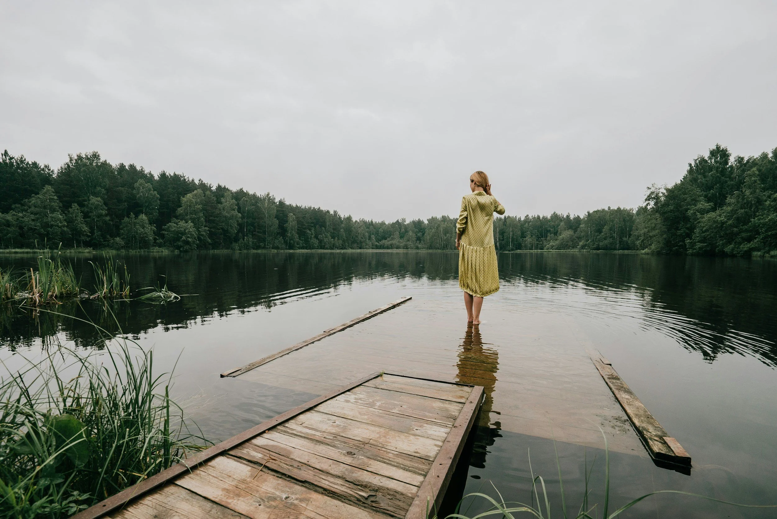 calm woman looking at the lake