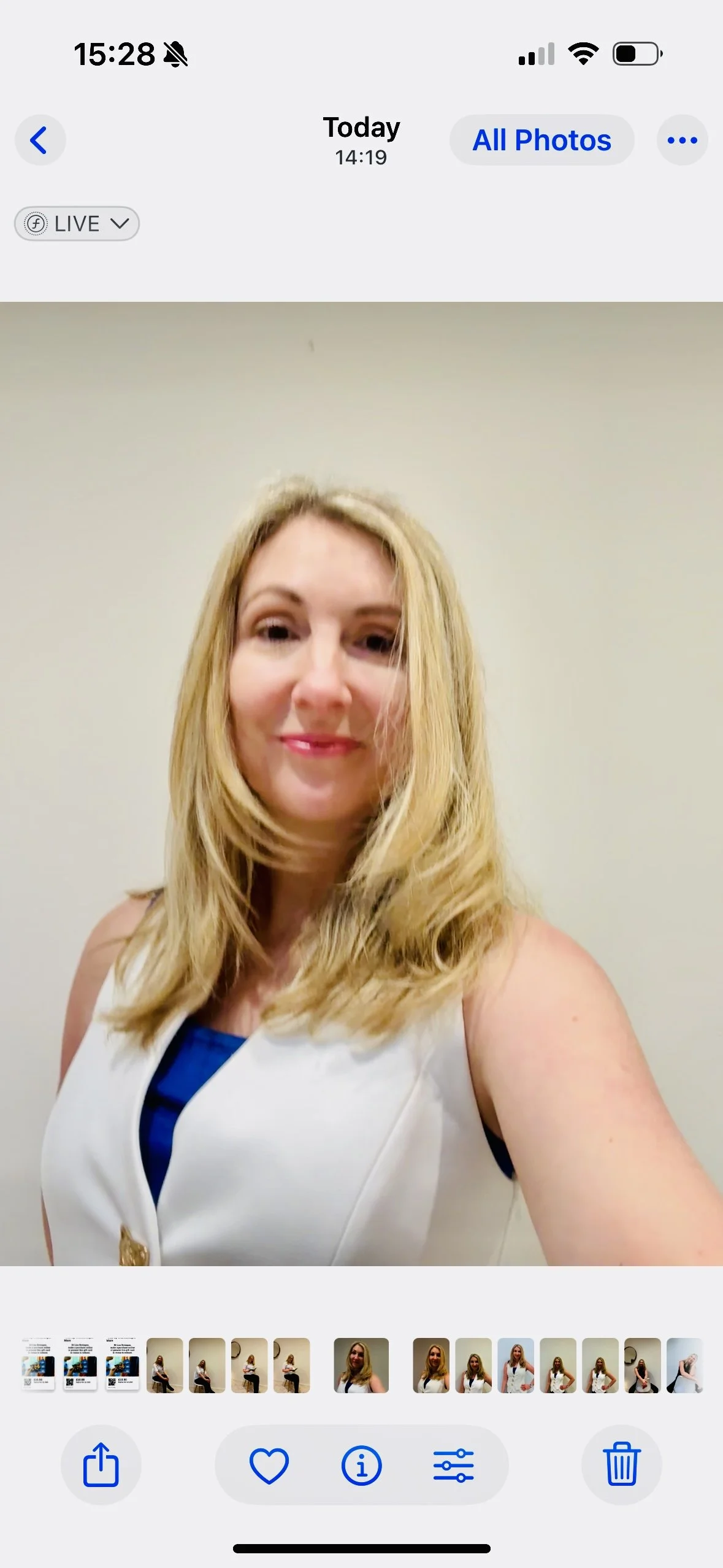 Blonde woman in a white waistcoat