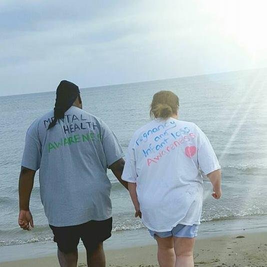 hazel and husband holding hands at the beach hazel and husband holding hands at the beach