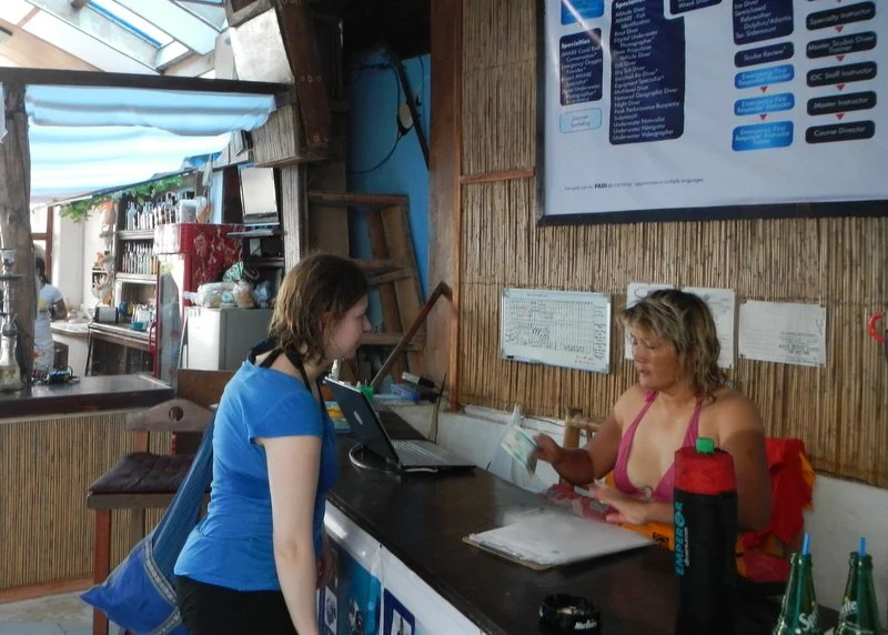 Customer relations! (check out the tan lines!!)