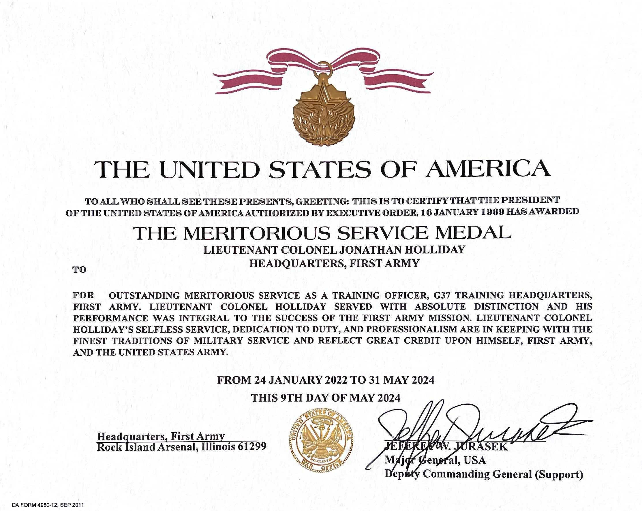 Certificate of the Meritorious Service Medal awarded to Lieutenant Colonel Jonathan Holliday, signed by Major General USA, from the First Army Headquarters, dated May 9, 2024.