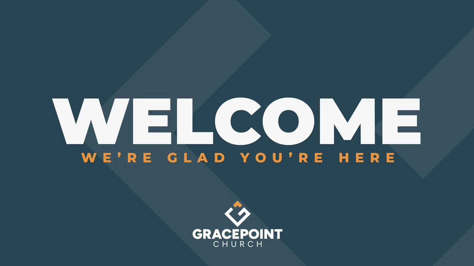 Welcome sign with the text 'We're glad you're here' and the Gracepoint Church logo.
