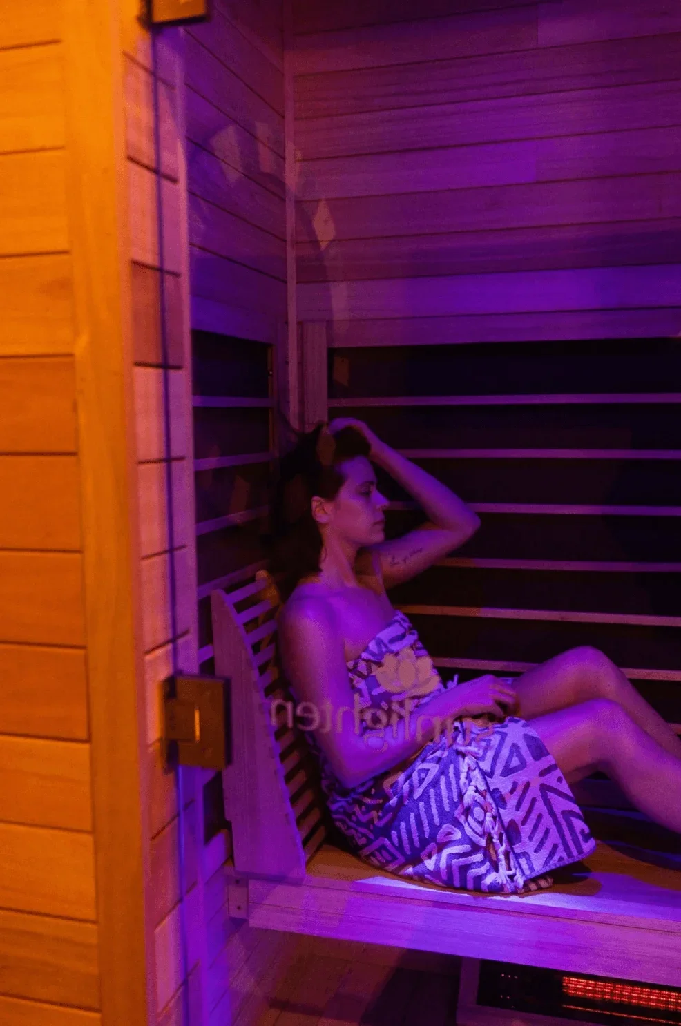 pure-sweat-studios-girl-in-sauna.webp