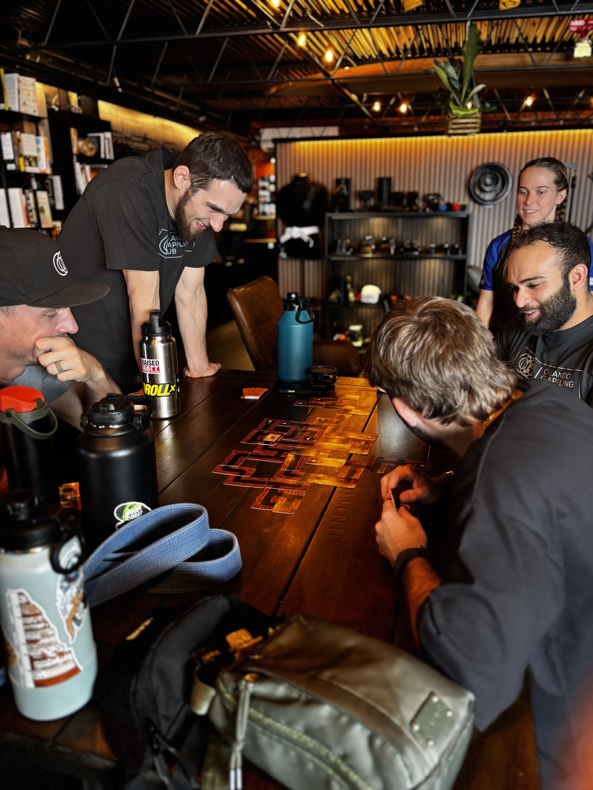 members playing a card game in the lounge