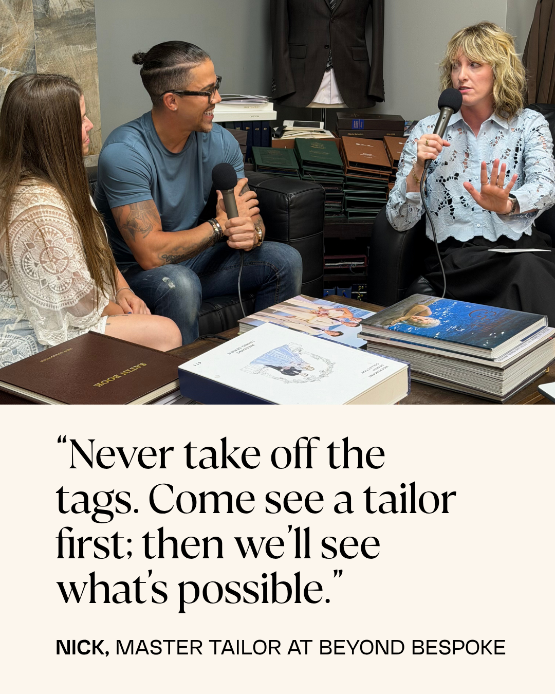 A tailor, male, and office manager, female, sitting on a couch talking to Natalie Tincher, podcast host. Fabric swatches are behind them. They all have microphones in hand.