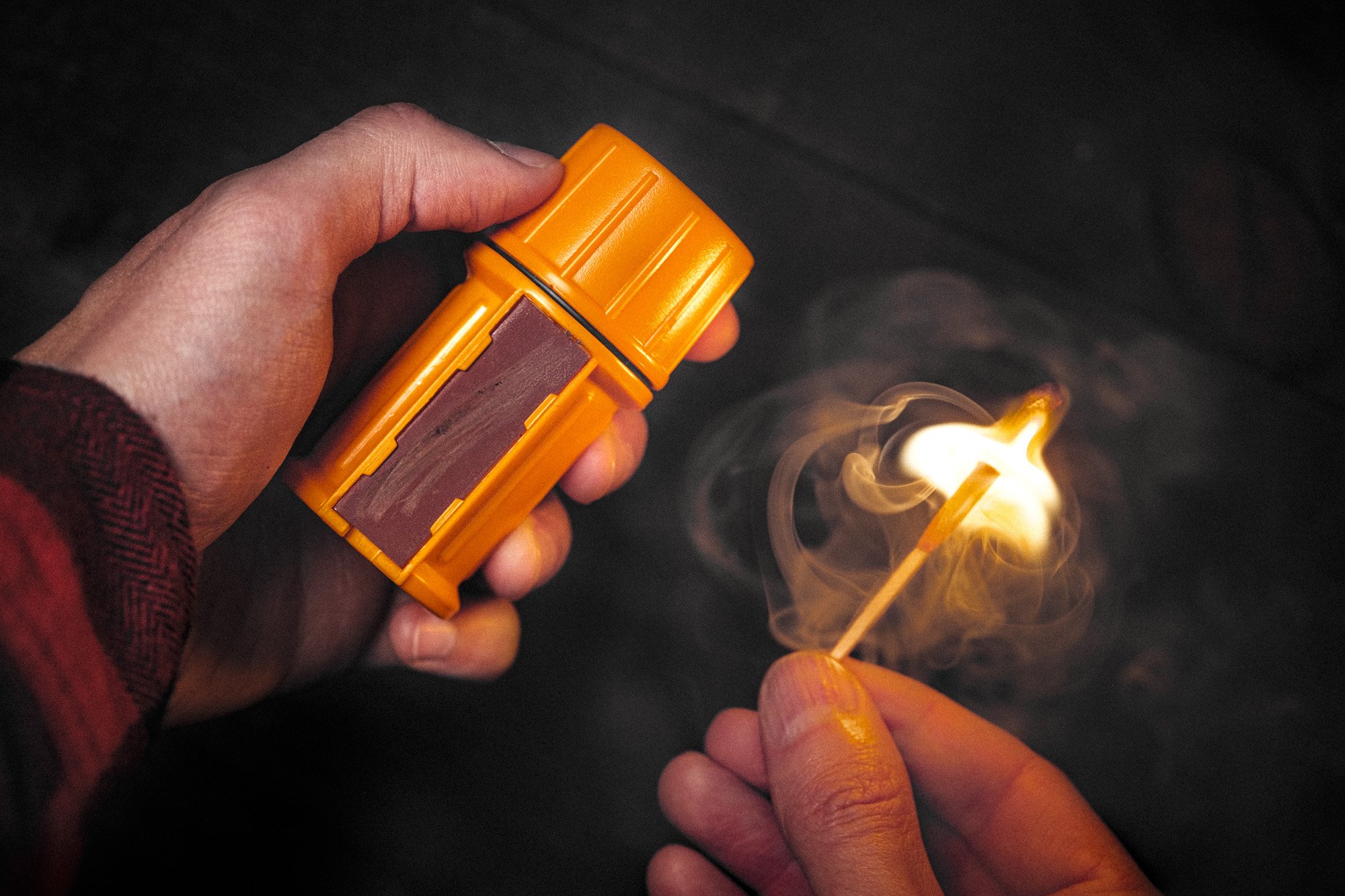 UCO Stormproof Match being lit for campfire