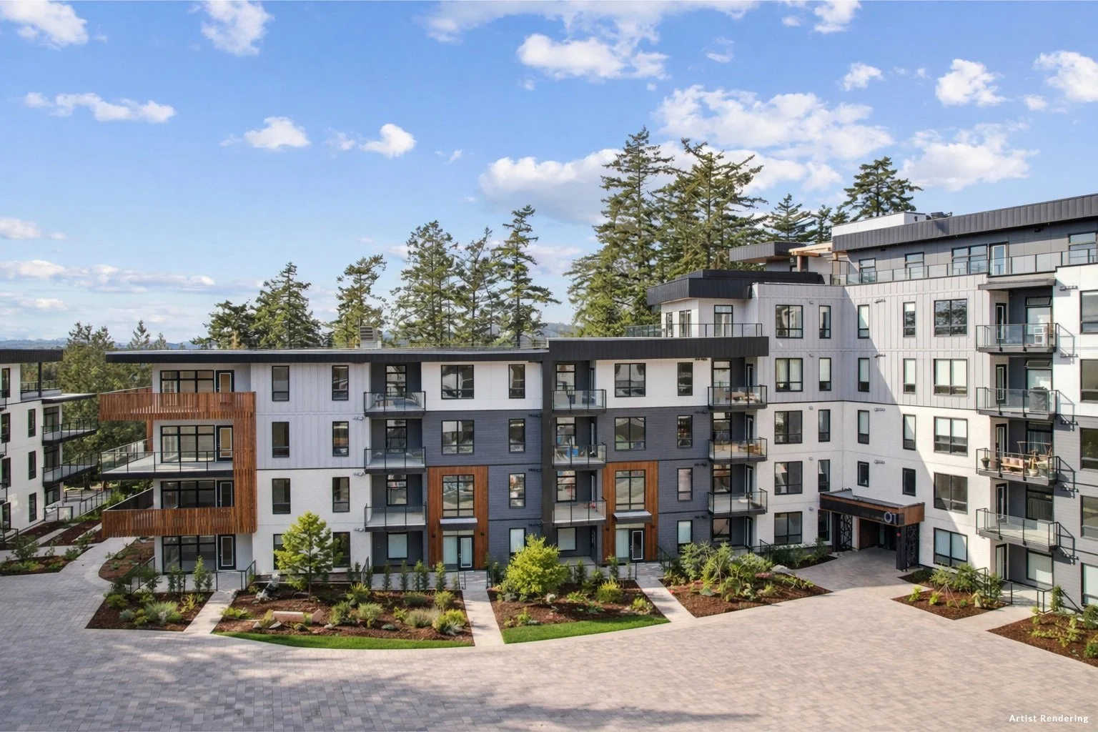 Modern multi-story apartment complex with balconies, surrounded by landscaped gardens and trees, under a blue sky with scattered clouds.