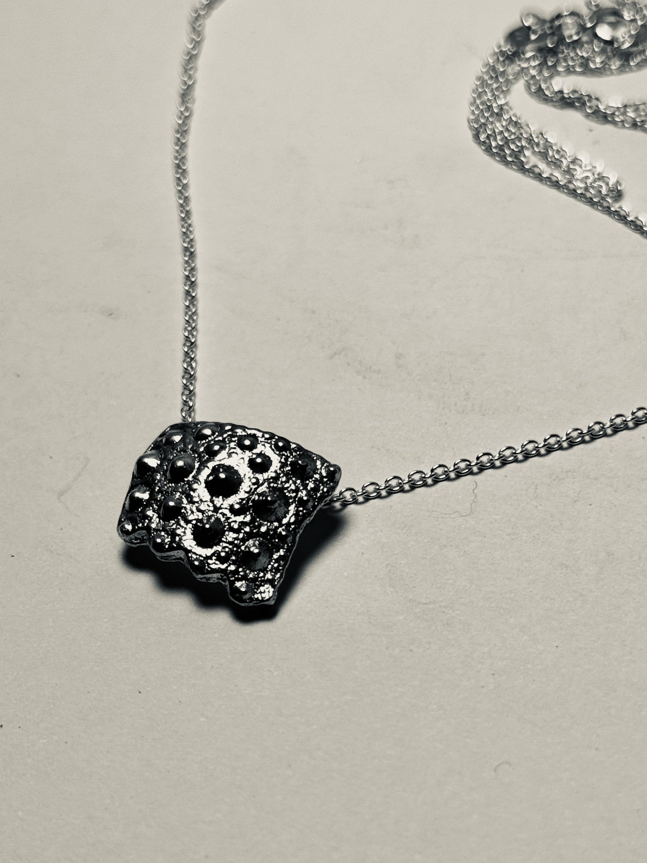 Kina Sandcast pendant