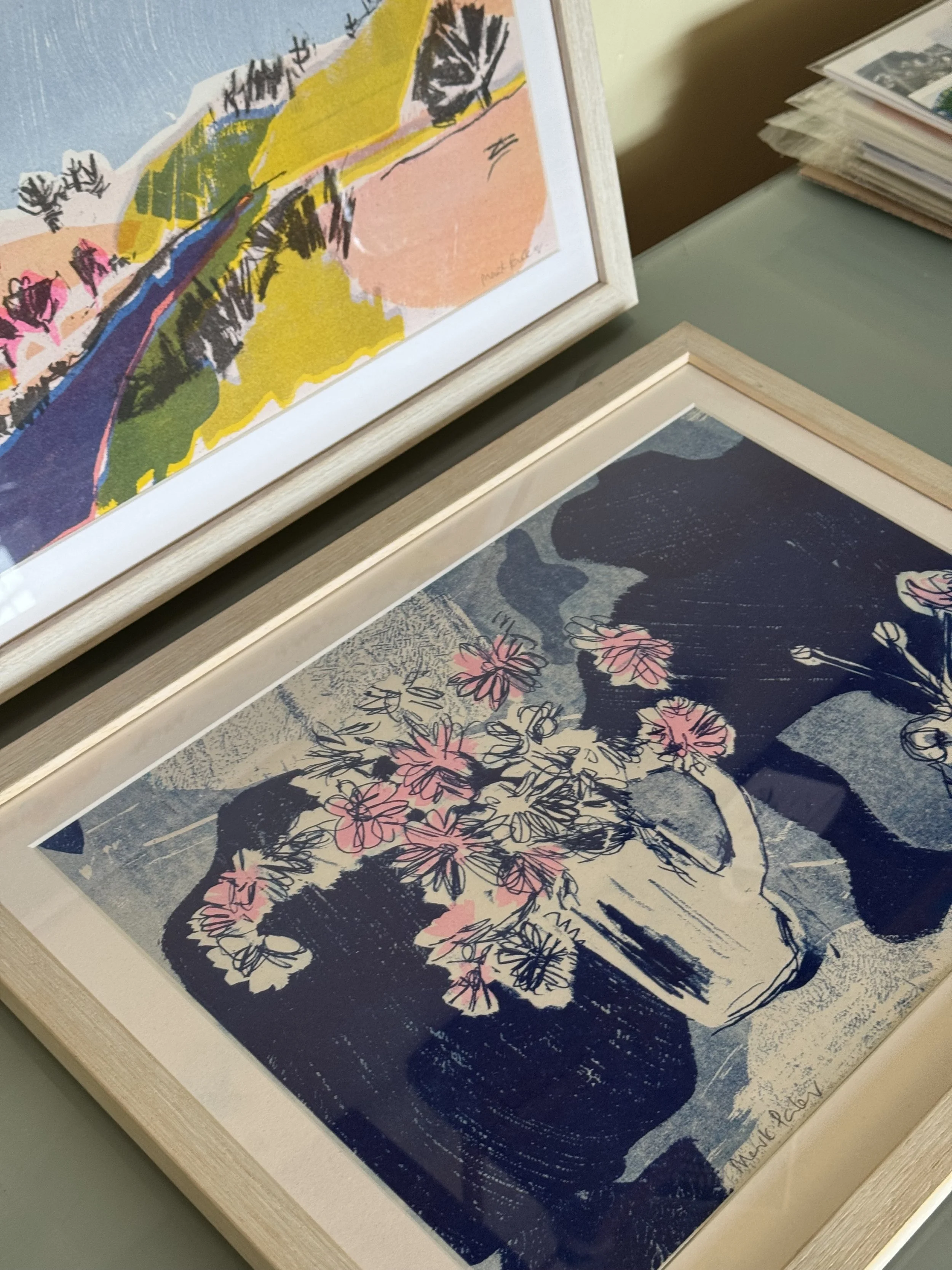 pink flowers upon blue textile framed  (after Bernat)
