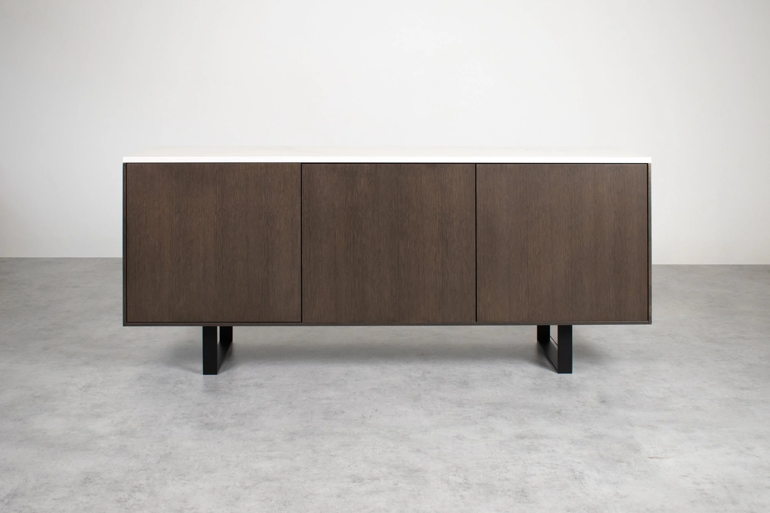 Opus Magnum - Loop Leg Credenza Credenza.jpg