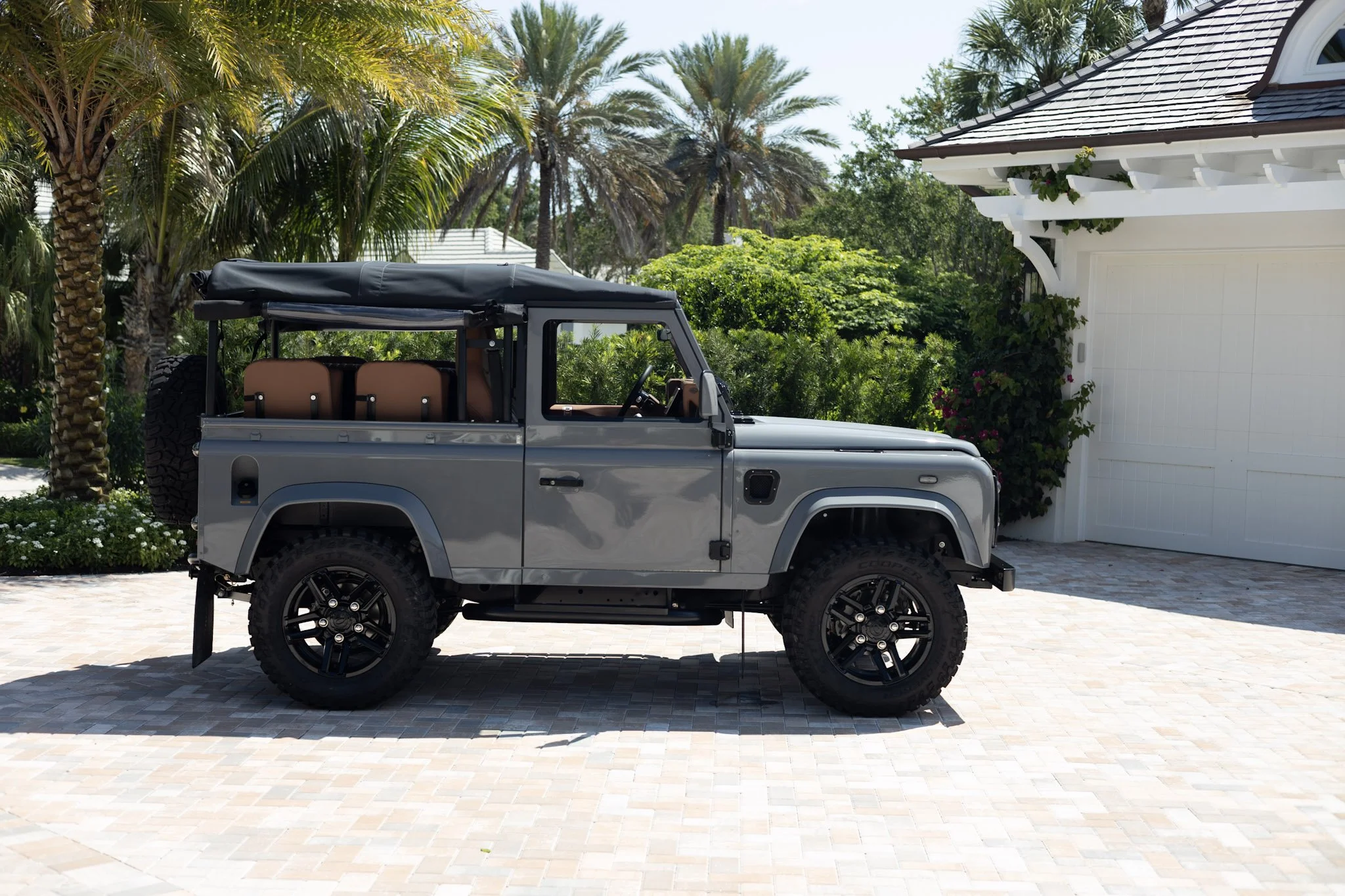 Shoreline Defender 90 soft top in Nardo Grey with a black canvas roof