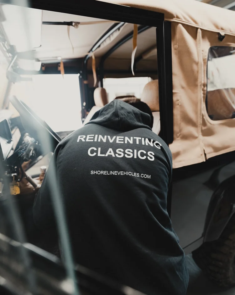 Shoreline technician working on a Land Rover Defender interior build