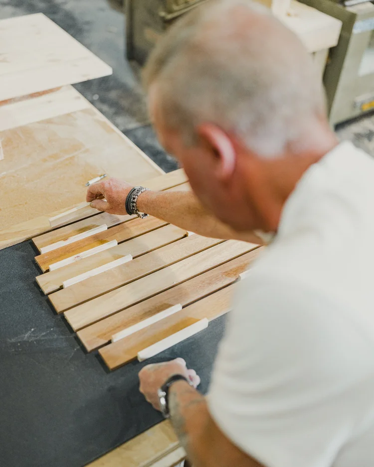 Fitting and sanding timber panels on a custom Land Rover Defender
