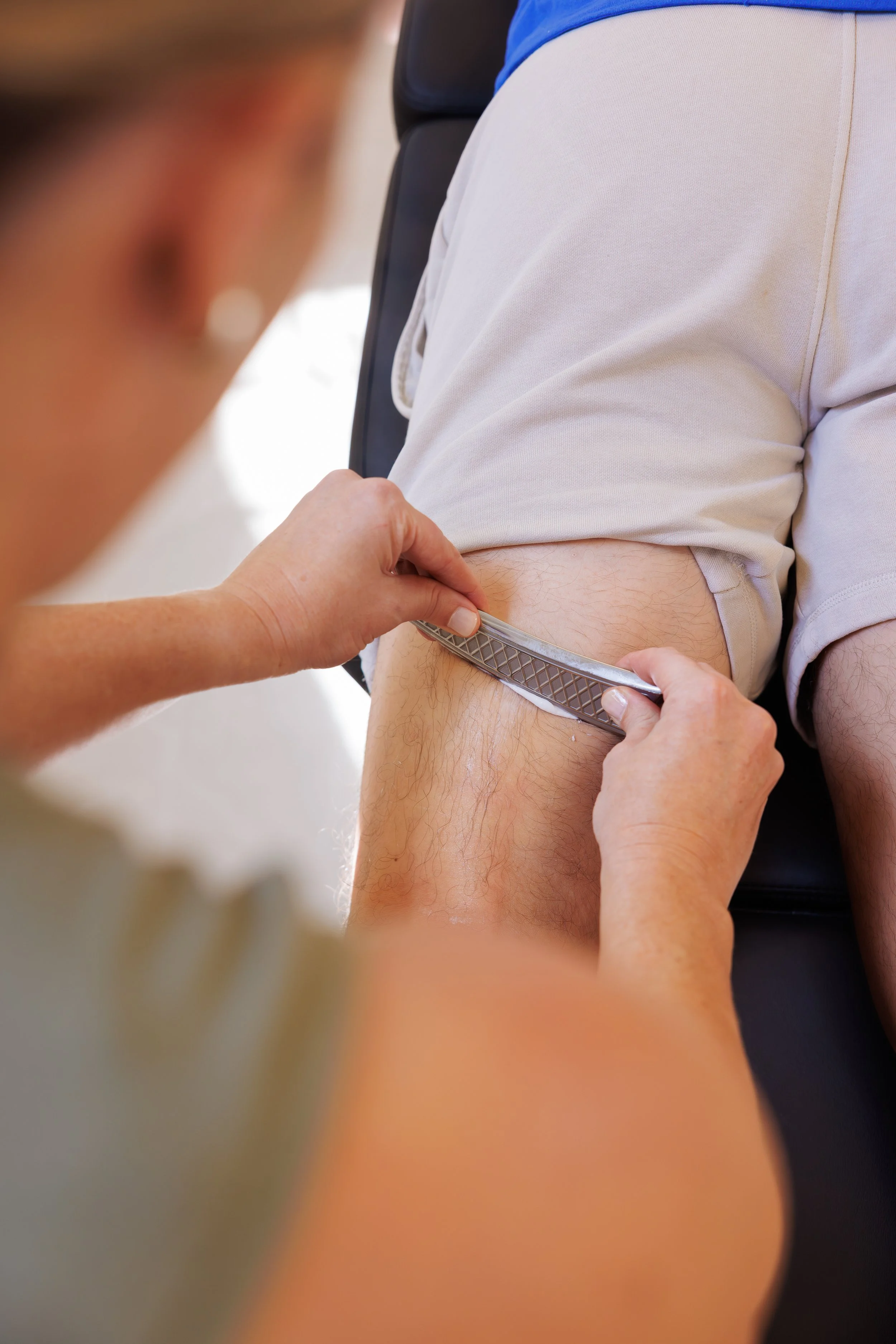 IASTM therapy for shoulder pain at Sarasota chiropractic clinic