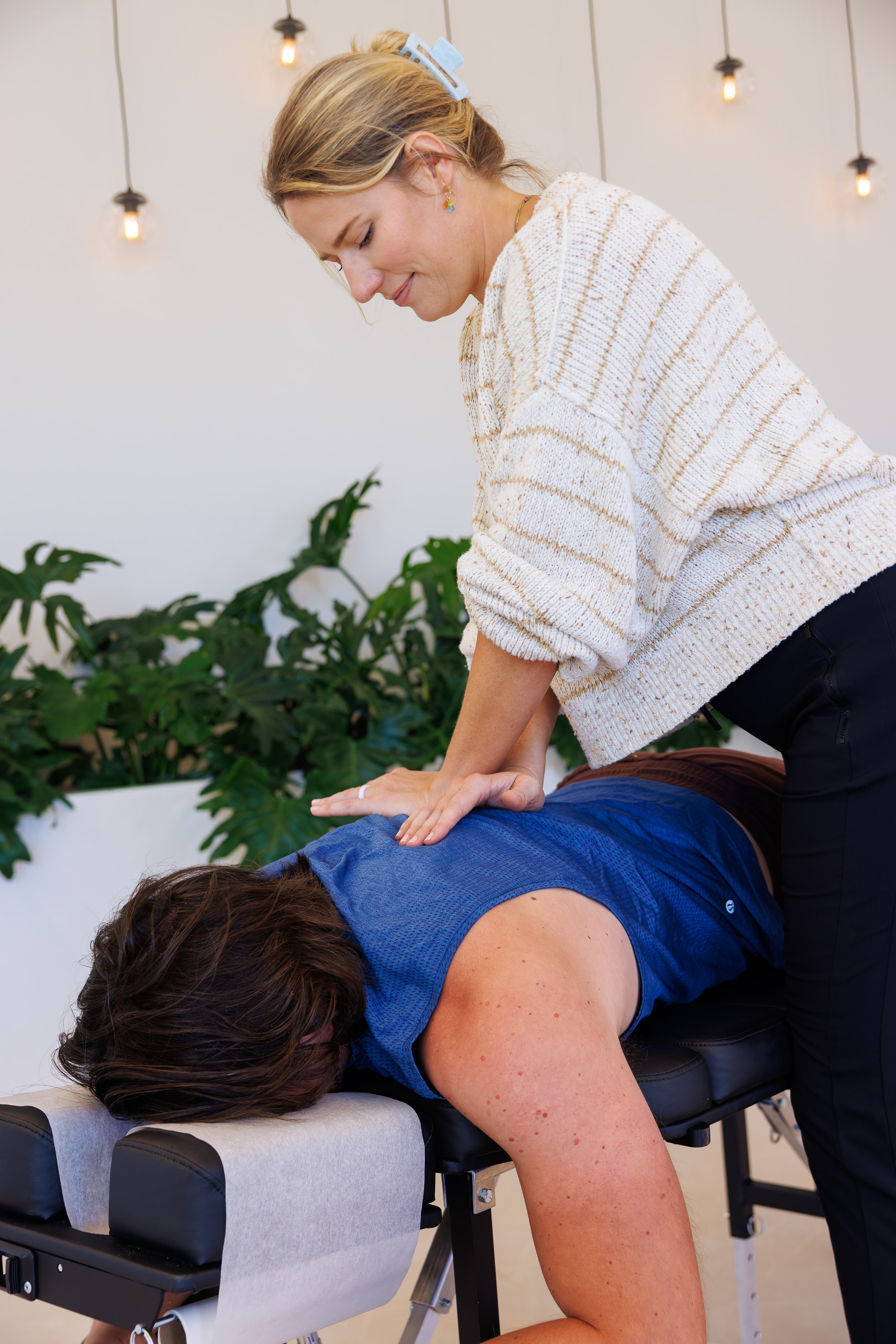 Chiropractic adjustment for neck pain at Well Co Chiropractic Sarasota