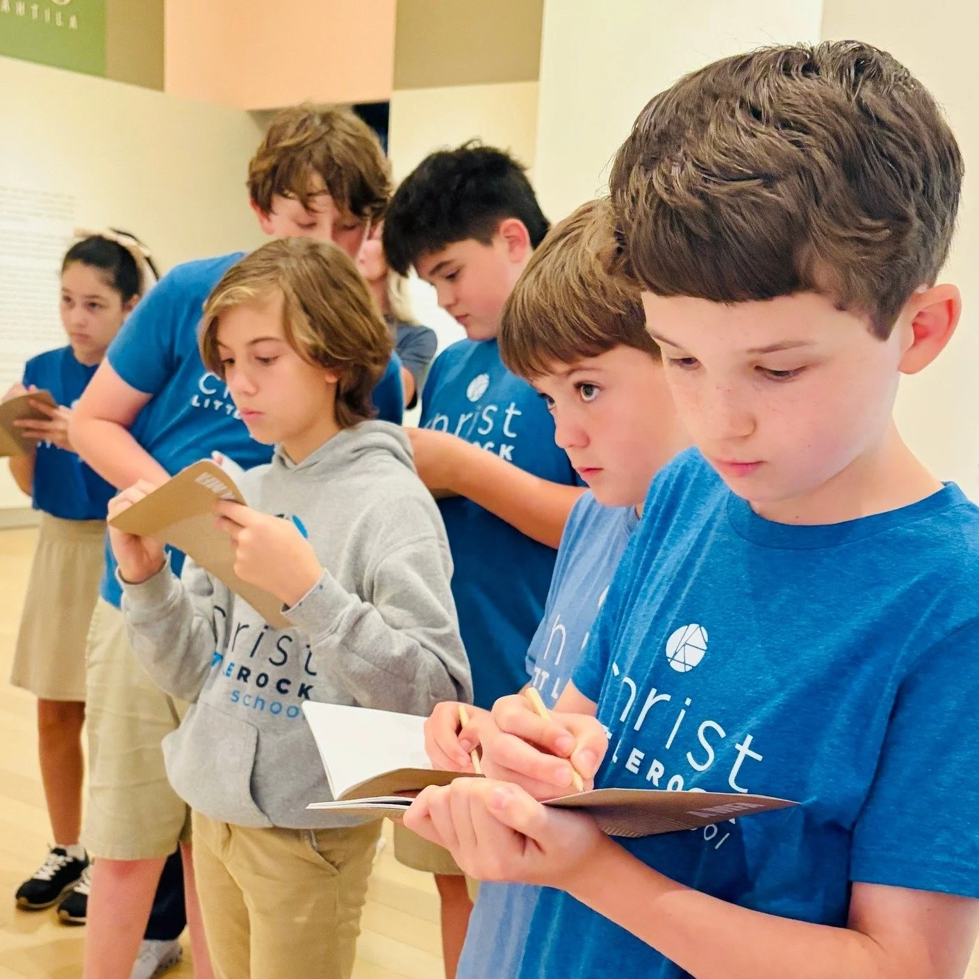 Students at Christ Little Rock School participating in a hands-on classroom activity, reflecting the focused learning environment families value when comparing private and public schools in Little Rock