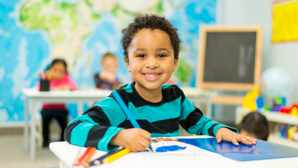 Child practicing classroom skills and creativity for kindergarten readiness at Christ Little Rock School.