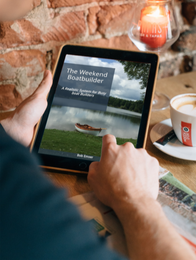image of man reading "The Weekend Boatbuilder" on his tablet
